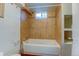 Updated bathroom featuring white bathtub with tiled walls, providing a clean and modern space at 7970 Wolff Ct, Westminster, CO 80030