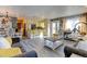 Open living space featuring dining room, kitchen, living room and hardwood floors at 7970 Wolff Ct, Westminster, CO 80030