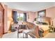 Elegant bedroom with vintage furnishings, soft lighting, and charming decor at 29857 Park Village Dr, Evergreen, CO 80439