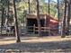 Horse shelter area includes a red outbuilding and fencing; provides a dedicated space for animal care at 36351 County Road 21, Elizabeth, CO 80107