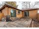 Exterior of house shows a wooden deck and sliding glass doors for easy access at 53 S Eagle Cir, Aurora, CO 80012