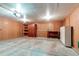 Spacious garage featuring shelving and workspace for projects and storage at 53 S Eagle Cir, Aurora, CO 80012