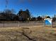 View of Little's Creek Park with community signage and nearby neighborhood amenities at 112 W Sterne Pkwy, Littleton, CO 80120