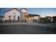 Attractive community clubhouse exterior featuring modern farmhouse design and well-manicured landscaping at 8836 Whiteclover St, Littleton, CO 80125