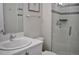 Stylishly updated bathroom features a modern vanity with a shower stall with glass door at 2147 N Downing St, Denver, CO 80205