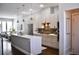 Modern kitchen with an island, stainless steel appliances, and a bright, open floor plan at 2147 N Downing St, Denver, CO 80205