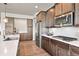 Well-equipped kitchen featuring stainless steel appliances, sleek countertops, and ample cabinet space at 7950 Piney River Ave, Littleton, CO 80125
