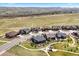 Panoramic aerial view of a residential neighborhood with lush green spaces and well-maintained homes at 7950 Piney River Ave, Littleton, CO 80125