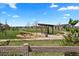 A neighborhood park featuring a covered seating area, mature trees, and walking paths at 7950 Piney River Ave, Littleton, CO 80125