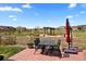 Outdoor patio area featuring a dining table and chairs, perfect for outdoor entertaining at 7950 Piney River Ave, Littleton, CO 80125
