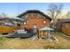 The lovely backyard features a patio and outdoor seating area at 1453 S Lafayette St, Denver, CO 80210