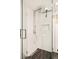 Contemporary bathroom with glass-enclosed shower featuring rainfall showerhead and modern fixtures at 1453 S Lafayette St, Denver, CO 80210