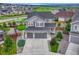 Aerial view of home showing the fenced backyard and neighborhood in a manicured and attractive community at 6470 Amur Ct, Castle Rock, CO 80108