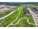 Aerial view of a neighborhood with a home near a greenbelt and walking path at 6470 Amur Ct, Castle Rock, CO 80108