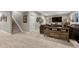 Spacious finished basement with stairs, and comfortable seating area at 6470 Amur Ct, Castle Rock, CO 80108