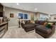 Relaxing basement with cozy seating, recessed lighting, and shuttered windows at 6470 Amur Ct, Castle Rock, CO 80108