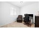 Well-lit bedroom designed for a gaming room, with comfortable chair and desk at 47 N Uriah St, Aurora, CO 80018