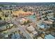 Aerial shot of neighborhood with tennis courts and mature tree coverage at 115 S Jasmine St, Denver, CO 80224