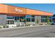 Clean modern storefront for Clark's Market on a sunny day in Lowry, CO, for shopping essentials at 115 S Jasmine St, Denver, CO 80224