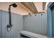 Private outdoor shower featuring a built-in bench and modern fixtures, perfect for rinsing off after outdoor activities at 115 S Jasmine St, Denver, CO 80224