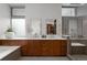 Elegant bathroom with dual sinks, sleek wood cabinets, and a luxurious glass shower at 3233 Tejon St # 305, Denver, CO 80211