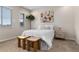 Charming bedroom featuring neutral walls, plush carpet, and stylish decor for a cozy retreat at 3233 Tejon St # 305, Denver, CO 80211