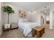 Bright bedroom with a comfortable bed, modern accents, and ample natural light at 3233 Tejon St # 305, Denver, CO 80211