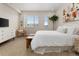 Serene bedroom featuring neutral walls, plush carpet, and stylish decor at 3233 Tejon St # 305, Denver, CO 80211