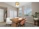 Well-appointed home office with a stylish wooden desk, ample lighting, and serene decor at 3233 Tejon St # 305, Denver, CO 80211