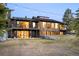 Beautiful two-story home with a spacious yard, balconies, and large windows providing lots of natural light at 18910 Augusta Dr, Monument, CO 80132