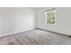 Bedroom featuring natural light and carpeted floors at 9471 Crossland Way, Highlands Ranch, CO 80130