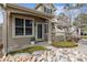 Charming front entrance with well-maintained landscaping and inviting facade at 9471 Crossland Way, Highlands Ranch, CO 80130