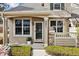 Charming front entrance with well-maintained landscaping and inviting facade at 9471 Crossland Way, Highlands Ranch, CO 80130