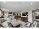 Spacious living room with natural light and a view of the open floor plan at 85 Rampart Way # 206, Denver, CO 80230
