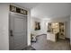 Office area with custom built-ins and neutral decor at 85 Rampart Way # 206, Denver, CO 80230