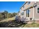 Backyard features a patio area with grill, perfect for outdoor entertaining at 2460 Switch Grass Way, Castle Rock, CO 80109