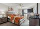 Modern bedroom featuring a gray wood-look bed frame and dresser at 2460 Switch Grass Way, Castle Rock, CO 80109