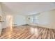 Spacious living room with hardwood floors and ample natural light, offering a comfortable living space at 8208 S High Ct, Centennial, CO 80122