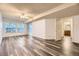 Spacious living room with wood floors, a ceiling fan, and a sliding door at 8208 S High Ct, Centennial, CO 80122