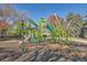 A colorful playground features slides, climbing structures, and other recreational equipment for outdoor fun in the community at 8208 S High Ct, Centennial, CO 80122