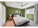Comfortable bedroom with a ceiling fan, and a window that brings in natural light at 1225 S Oneida St # 248, Denver, CO 80224