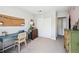 Inviting bedroom featuring a desk, storage and a window with a view of the outside at 1225 S Oneida St # 248, Denver, CO 80224