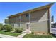 Charming home featuring a well-maintained front lawn and inviting entrance at 1225 S Oneida St # 248, Denver, CO 80224
