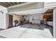 Spacious garage with storage and plenty of room for parking and hobbies at 1225 S Oneida St # 248, Denver, CO 80224