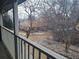 View from balcony overlooks a serene community landscape at 7505 W Yale St # 2103, Denver, CO 80227