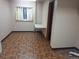 Basement room with a table and parquet flooring at 7505 W Yale St # 2103, Denver, CO 80227