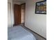 Main bedroom with a closet and wall art at 7505 W Yale St # 2103, Denver, CO 80227