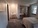Comfortable bedroom with mirrored closet and neutral tones at 7505 W Yale St # 2103, Denver, CO 80227