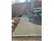 Small patio with chairs, table, and a rug at 7505 W Yale St # 2103, Denver, CO 80227