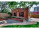 Charming brick guest house with landscaping and walkway at 1563 High St, Denver, CO 80218